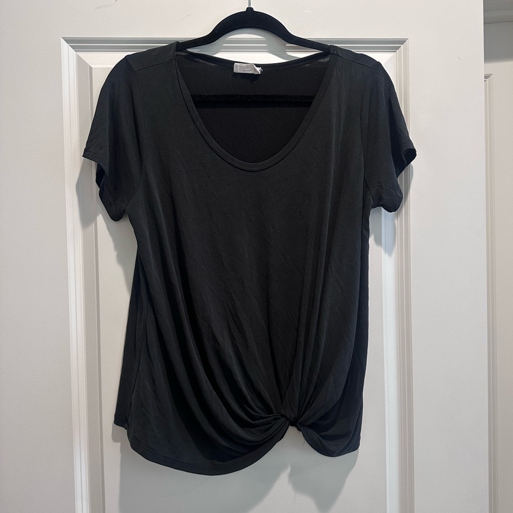 Sienna sky, size medium, cute detail on bottom with twist. Very comfortable